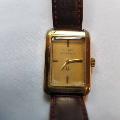 An awesome vintage "Bulova Accutron" ladies gold plated wrist watch with a leather strap