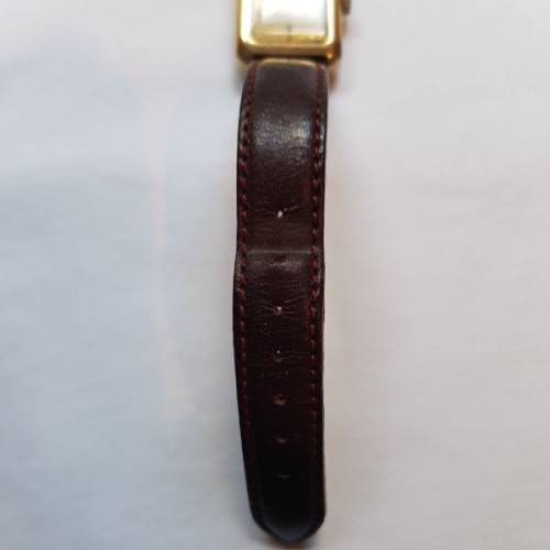 An awesome vintage "Bulova Accutron" ladies gold plated wrist watch with a leather strap