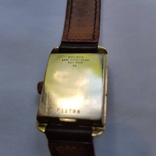 An awesome vintage "Bulova Accutron" ladies gold plated wrist watch with a leather strap
