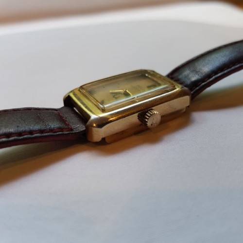 An awesome vintage "Bulova Accutron" ladies gold plated wrist watch with a leather strap
