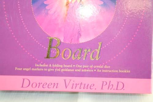 A boxed "Angel Guidance Board" by Doreen Virtue including folding board,crystal dice and booklet