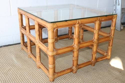 A lovely cane occasional/ coffee table with a removable glass top - stunning in a holiday home