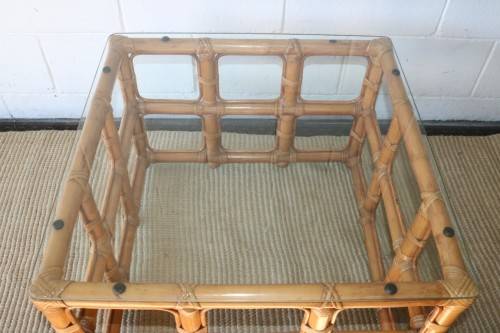 A lovely cane occasional/ coffee table with a removable glass top - stunning in a holiday home