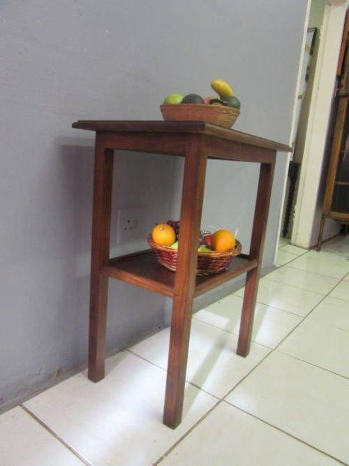 A wonderful vintage solid Teak occasional table with two levels in great condition