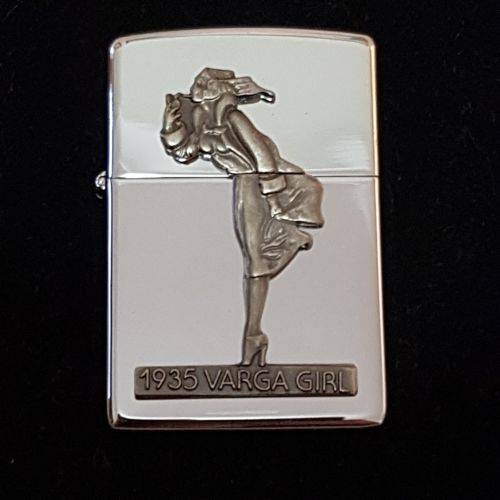 A magnificent 1993 "The Varga Girl 1935" Zippo windproof lighter in original box - very collectable!