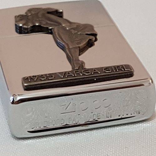 A magnificent 1993 "The Varga Girl 1935" Zippo windproof lighter in original box - very collectable!