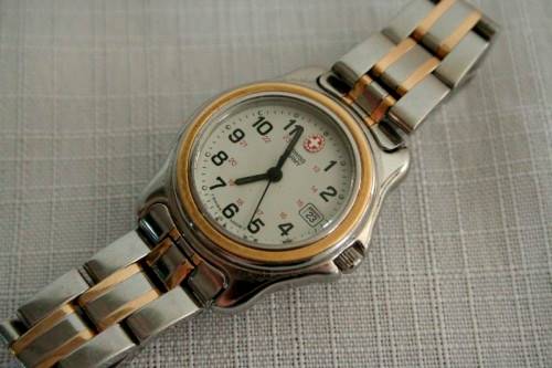 An awesome vintage original two-tone ladies Swiss Army wrist watch in awesome condition