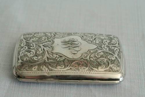 An exquisite antique (1905) hallmarked "Thomas Bishton" sterling silver engraved calling card case