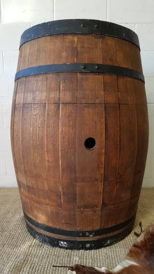 An amazing (larger) solid French Oak brandy barrel with its original hoops in good condition!