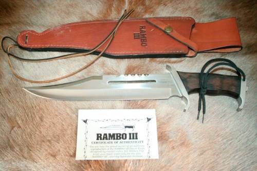 A HUGE original 1988 Rambo III Bowie knife in its original box with the sheath and certificate