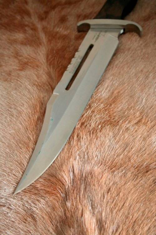 A HUGE original 1988 Rambo III Bowie knife in its original box with the sheath and certificate