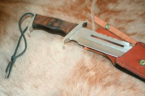 A HUGE original 1988 Rambo III Bowie knife in its original box with the sheath and certificate