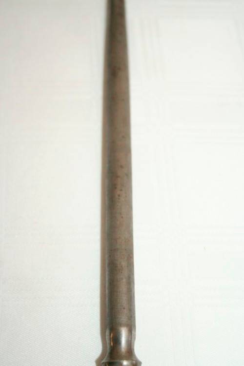 A stunning vintage boxed bone handle style carving knife and fork set with a sharpening steel