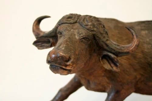 A stunning and very detailed large hand-carved African Buffalo carving in wonderful condition