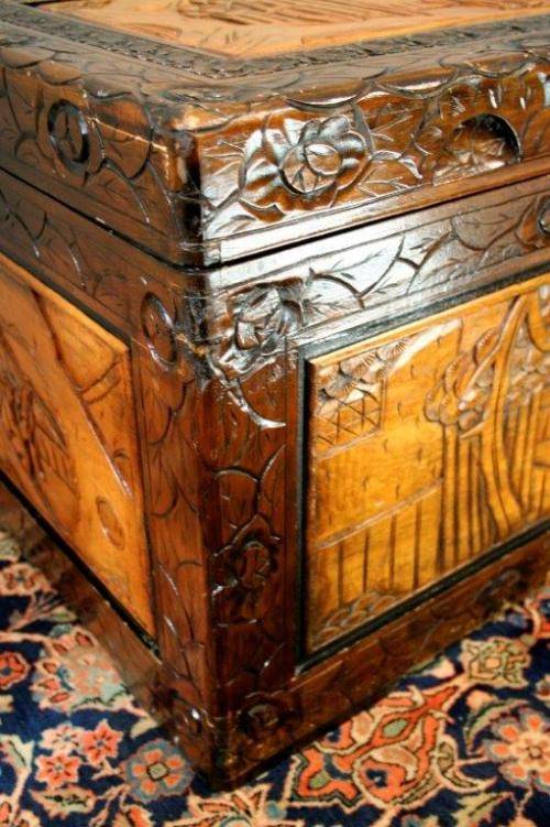 A superb & exquisitely made oriental teak and camphor wood hand carved kist w/ brass embellishments