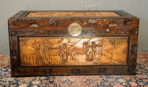 A superb & exquisitely made oriental teak and camphor wood hand carved kist w/ brass embellishments
