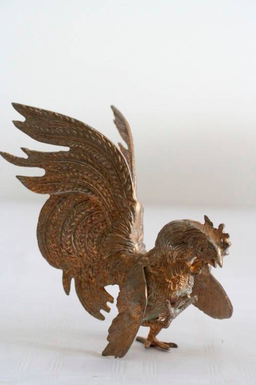 A stunning pair of rare dramatic vintage Italian made brass fighting roosters in great condition