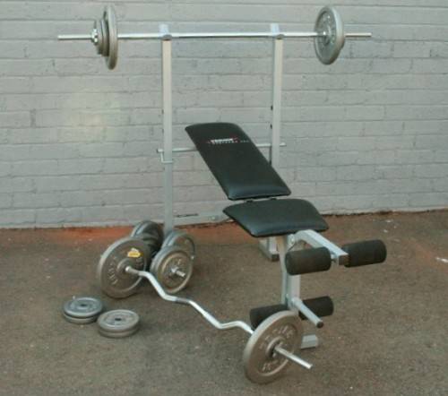 A fantastic original Trojan "Performa 300" bench & assorted weights in awesome condition