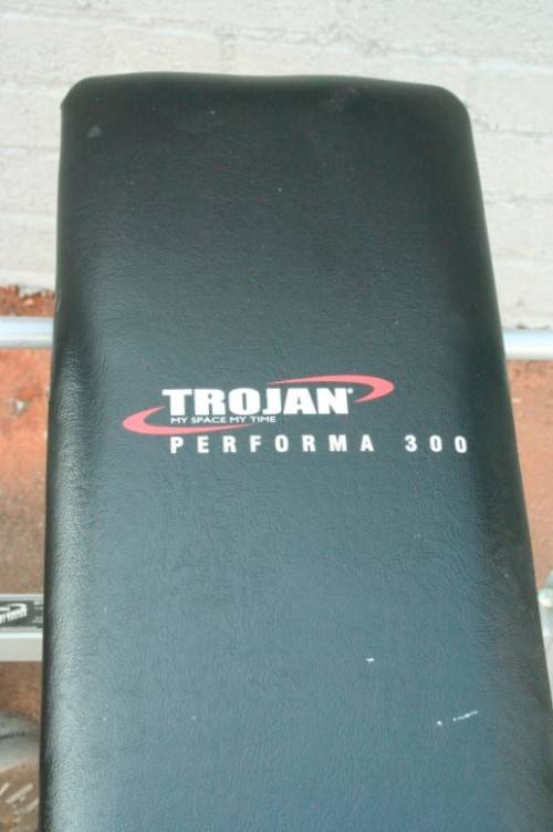 A fantastic original Trojan "Performa 300" bench & assorted weights in awesome condition