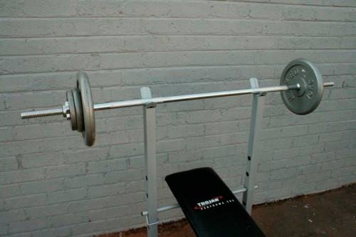 A fantastic original Trojan "Performa 300" bench & assorted weights in awesome condition