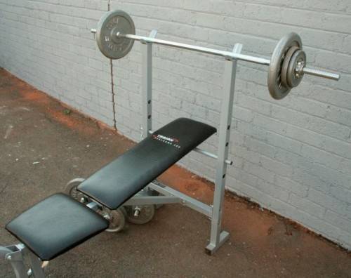 A fantastic original Trojan "Performa 300" bench & assorted weights in awesome condition
