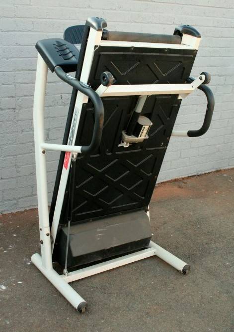 An incredible computerised original "Trojan" Optix Fold-able treadmill with hand-bar speed controls