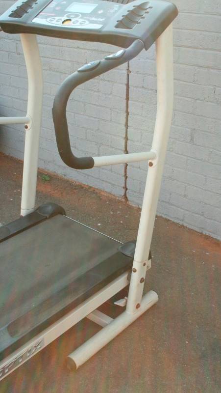 An incredible computerised original "Trojan" Optix Fold-able treadmill with hand-bar speed controls
