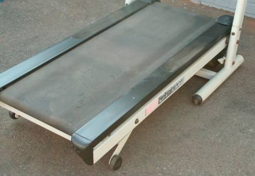 An incredible computerised original "Trojan" Optix Fold-able treadmill with hand-bar speed controls