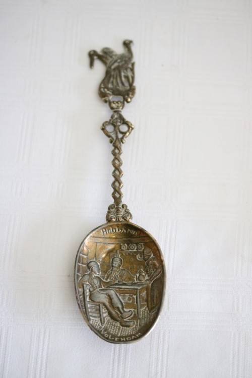 **RS17** Rare antique German made brass plated pewter figural spoon w/ a traditional Dutch pub scene
