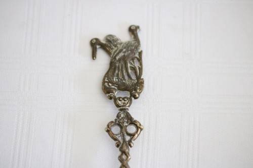 **RS17** Rare antique German made brass plated pewter figural spoon w/ a traditional Dutch pub scene