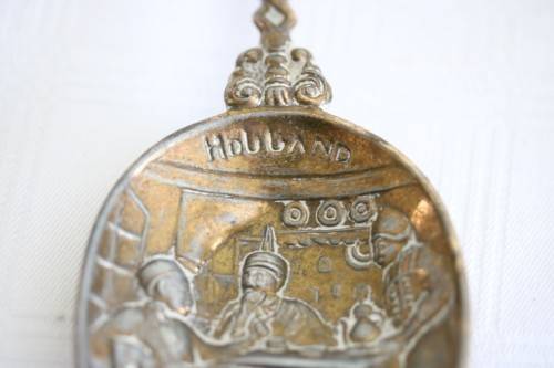**RS17** Rare antique German made brass plated pewter figural spoon w/ a traditional Dutch pub scene