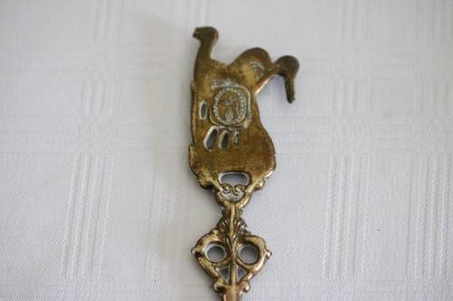 **RS17** Rare antique German made brass plated pewter figural spoon w/ a traditional Dutch pub scene