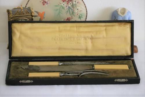 A stunning antique British made Wostenholm's "Celebrated Carver" boxed carving knife, fork & steel