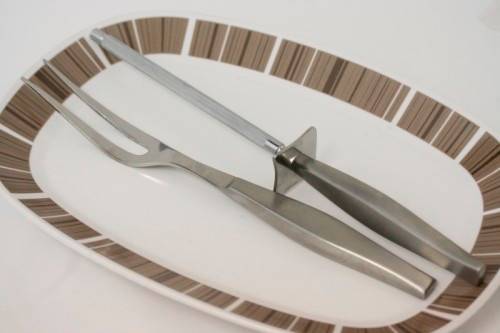 **RS17** An Eetrite "Valiant design" stainless steel matching carving fork and knife sharpener.