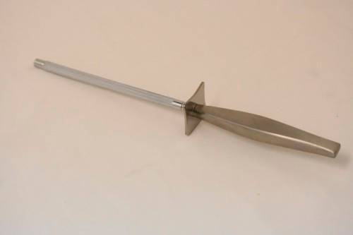 **RS17** An Eetrite "Valiant design" stainless steel matching carving fork and knife sharpener.