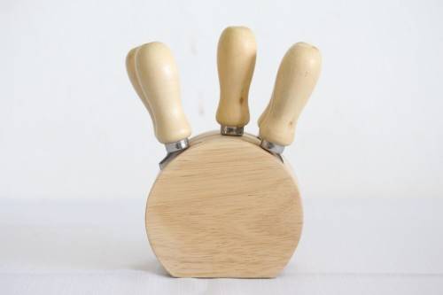 A wonderful stainless steel cheese knives and fork set in a wooden holder - an amazing gift!