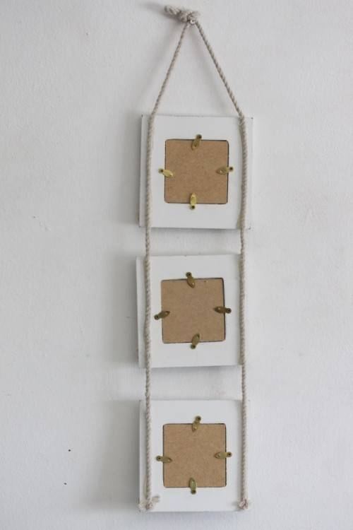 **RS17** A wonderful 3-photo wall hanging picture frame with a beach/ holiday theme to it