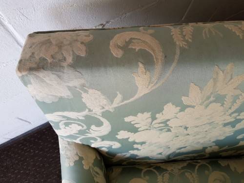 A wonderful "Moorgas & Sons" Brocade fabric couch with cushions & a floral pattern on it