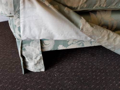 A wonderful "Moorgas & Sons" Brocade fabric couch with cushions & a floral pattern on it