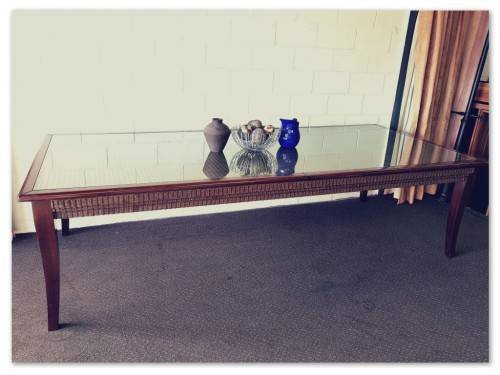 An awesome x-large 10-12 seater Mahogany dining table w/ wicker inlay under the glass top!