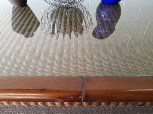 An awesome x-large 10-12 seater Mahogany dining table w/ wicker inlay under the glass top!