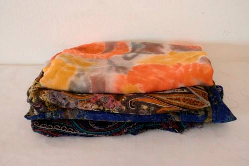 A lovely job lot of different colours and sizes of dress materials in good condition. RS17Sale