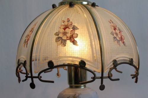 A lovely parlour table lamp with a glass panelled shade and brass-finished base - stunning on a desk