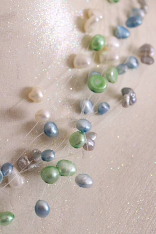 A superb white, blue, silver and green genuine pearl multi-strand ladies necklace w/ a silver clasp