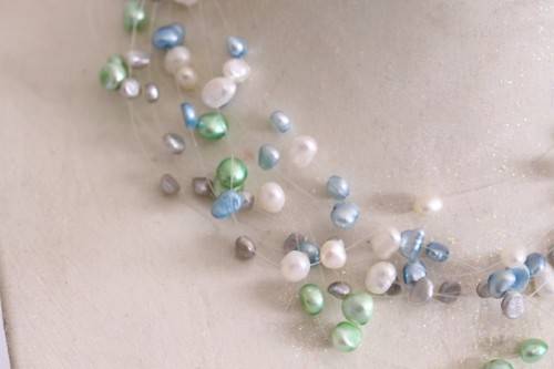 A superb white, blue, silver and green genuine pearl multi-strand ladies necklace w/ a silver clasp