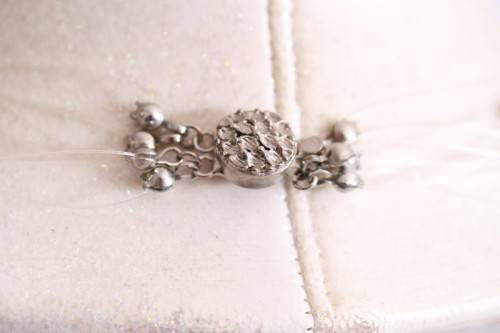 A superb white, blue, silver and green genuine pearl multi-strand ladies necklace w/ a silver clasp