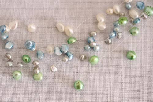 A superb white, blue, silver and green genuine pearl multi-strand ladies necklace w/ a silver clasp