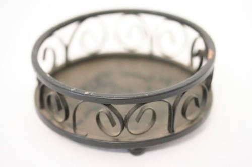 **RS17** Four lovely assorted metal candle holders, perfect in informal living areas.