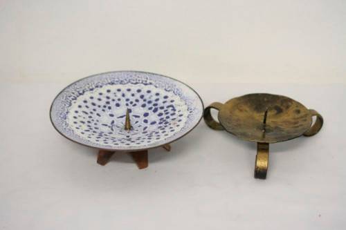 **RS17** Four lovely assorted metal candle holders, perfect in informal living areas.