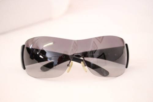 An awesome pair of black Italian made Prada (model SPR22M) ladies sunglasses w/ grey gradient lenses